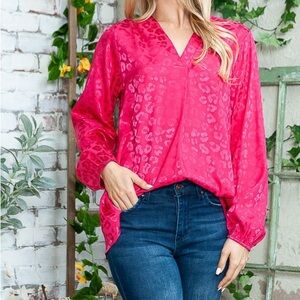Elegant Hot pink leopard print blouse. Perfect for date night, or office.